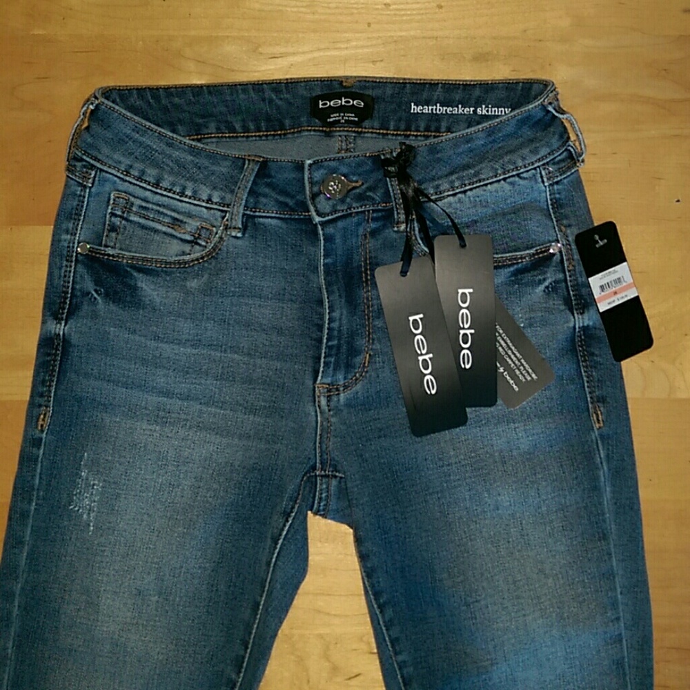 bebe heart breaker skinny distressed jeans sz 26